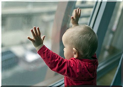 child looking out the window