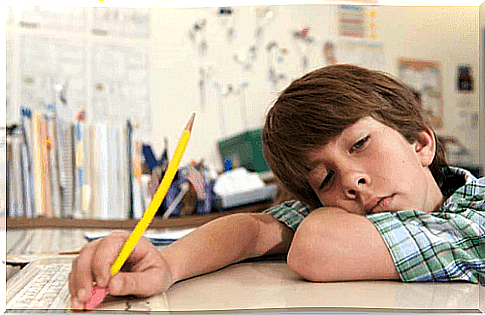 boy holding a pencil, Japanese method against laziness