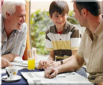 son-smiling-with-father-and-grandfather