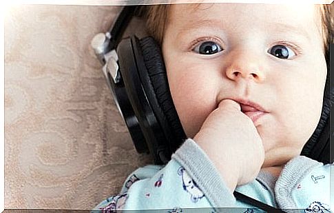 baby listening to music with headphones