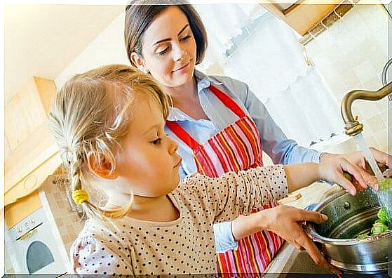 Cooking together is a way to entertain children while making dinner.