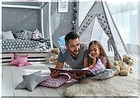 Father reading to his daughter personalized stories for children