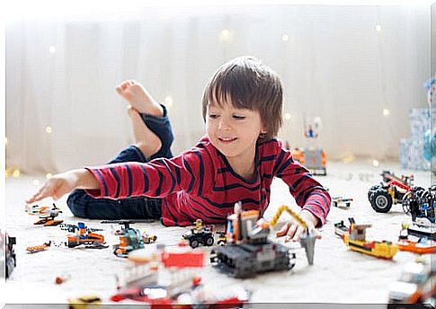 Boy with lots of toys tends to have rich child syndrome